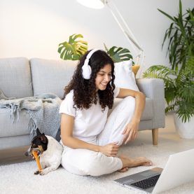 full-shot-smiley-woman-floor